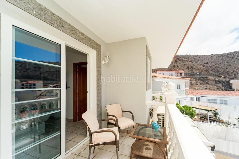 Foto bab9d1bf-13c7-427c-93e1-c07b8358404b. Casa adosada en calle tara 16 amplia casa adosada de 6 dormitorios con apartamento independiente, vistas al mar y azotea en Arguineguín en Mogán