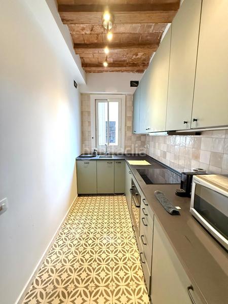 Foto 60553f36-49d8-48c7-b77f-20e9bb2a122c. Appartement in Raval Barcelona