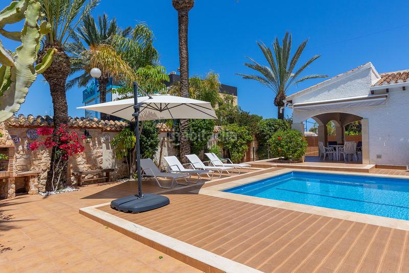 Foto 1f88f79b-ed49-431d-85a1-2b7774d4eb1c. Chalet with parking pool in Punta Prima Orihuela