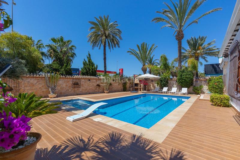 Foto 278d9802-01f9-4d1b-bb7c-9368fb5edd1b. Chalet with parking pool in Punta Prima Orihuela