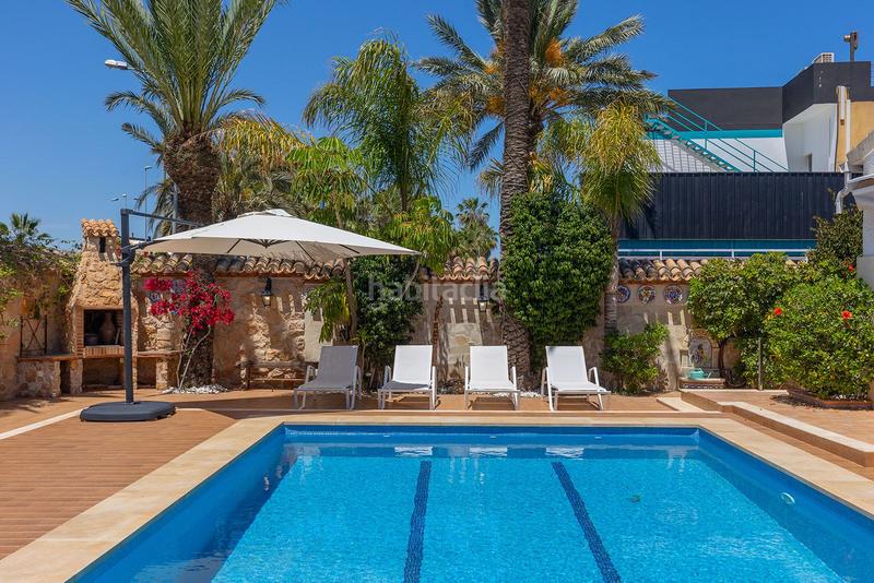 Foto f7b4f9b3-e298-4505-86db-ac04a4b4f15c. Xalet amb aparcament piscina a Punta Prima Orihuela
