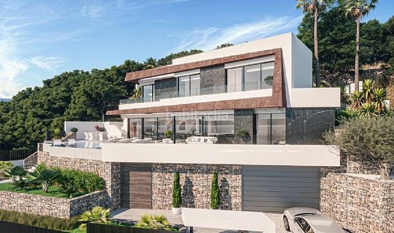 Foto fb049f47-00b9-4f3c-8380-e44d362eff86. Chalet nueva construcción de villa de último diseño con excelente calidades y con unas increibles vistas al mar. en Calp