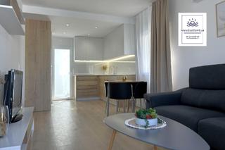 Appartement à Calle breten 39. Apartamento adosado recién reformado 59 m  planta baja con 2 dor