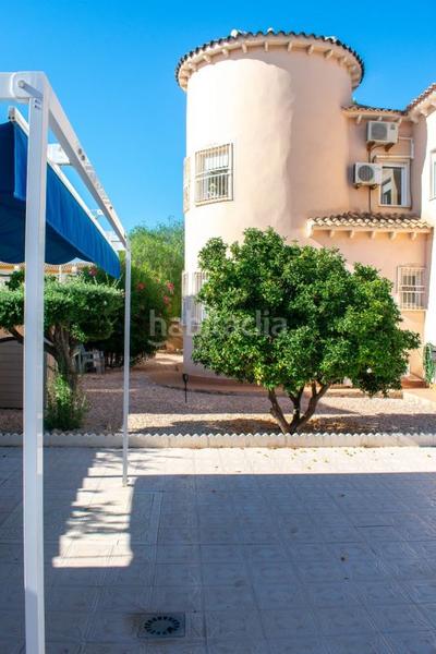 Foto a7c01c5f-bf7d-46fc-9df5-26c0af9a6ece. Chalet avec piscine dans La Zenia Orihuela