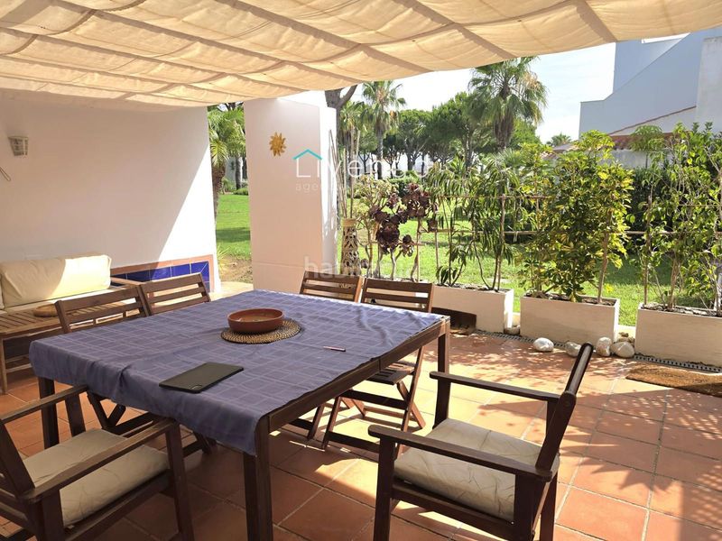 Foto f8cc8fe2-8799-4d10-a0f9-c1fde3f04886. Casa adossada amb aparcament piscina a Novo Sancti Petri Chiclana de la Frontera
