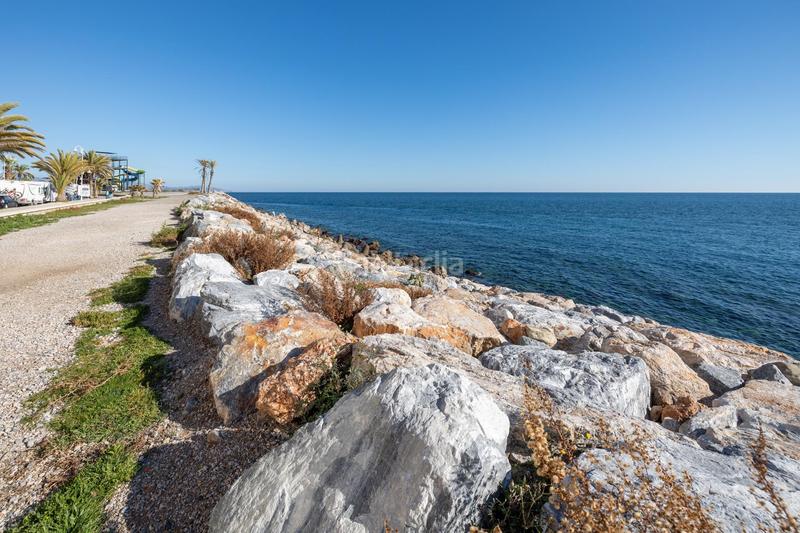 Foto b3c238c6-c925-4db2-9220-e4fdfc391252. Piso !!espectacular vivienda en primera linea de playa!! en Almuñécar