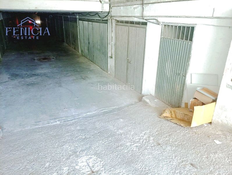 Foto f0d32019-4de9-4d20-a82b-ffcf75ee2d2d. Parking coche garaje cerrado para dos vehículos a la venta en La Herradura centro en Almuñécar