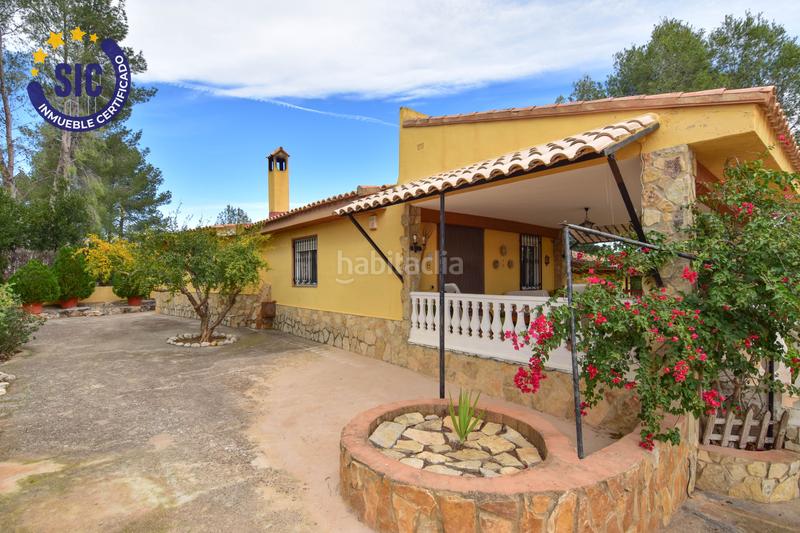 Foto 128982d3-17ab-4597-b643-2ec75030122e. Casa en Enguera - parcela 140 paraje el charral 104 gran chalet rustico en montaña en Enguera