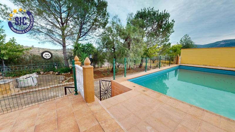 Foto 277ba5a1-d3fd-4e61-96c0-f496f9531ff3. Casa en Enguera - parcela 140 paraje el charral 104 gran chalet rustico en montaña en Enguera