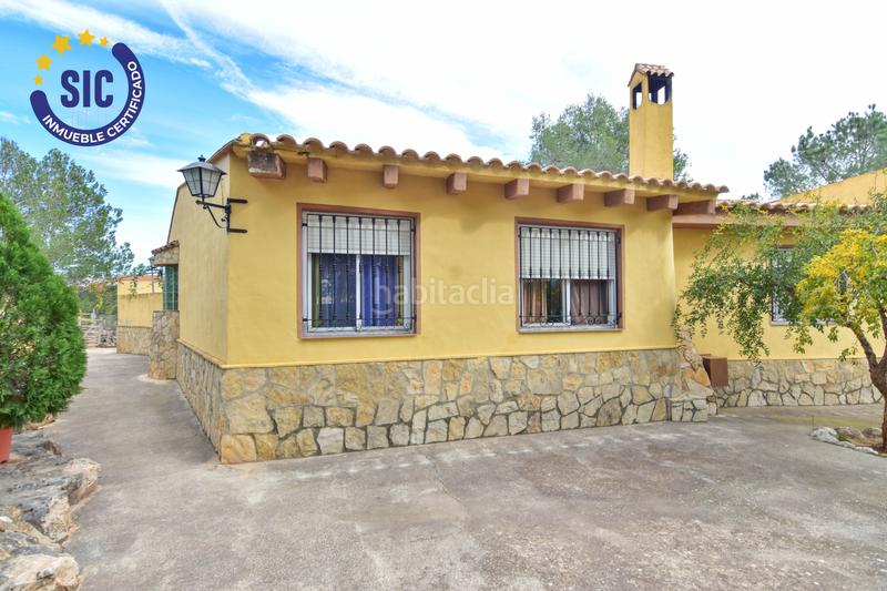 Foto 3f85e46f-58fb-4fad-bea2-e330fdeb7079. Casa en Enguera - parcela 140 paraje el charral 104 gran chalet rustico en montaña en Enguera