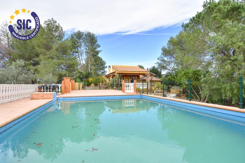 Foto c3ebd06a-77a4-4367-bd8c-a4500de306e5. Casa en Enguera - parcela 140 paraje el charral 104 gran chalet rustico en montaña en Enguera
