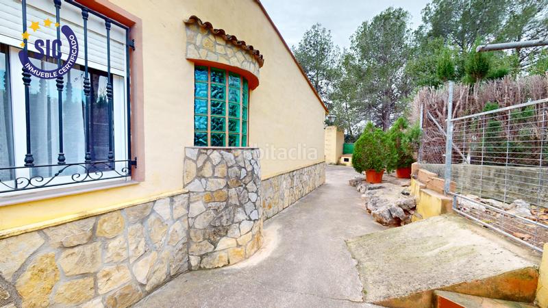 Foto d5f8a980-c87c-4d4d-b206-3a6837df660d. Casa en Enguera - parcela 140 paraje el charral 104 gran chalet rustico en montaña en Enguera