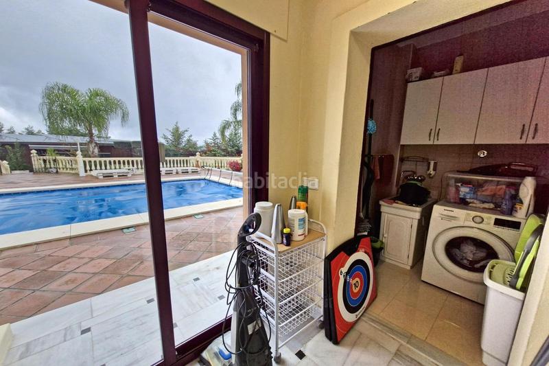 Foto 5a857596-989b-46aa-8d53-770fed8bd2cd. Chalet mit parking pool in Coín