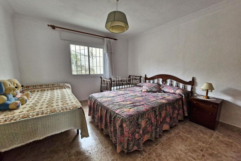 Foto a7f97714-bc3b-4f37-949c-3012167f6eeb. Casa adossada amb aparcament a Guaro