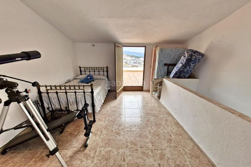 Foto cb0f52e1-7d5d-45e8-a29d-f86f32ccd831. Casa adossada amb aparcament a Guaro