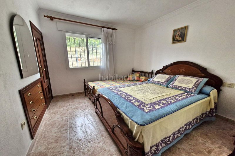 Foto d688503f-43af-448b-b030-8826b1d6339e. Casa adossada amb aparcament a Guaro