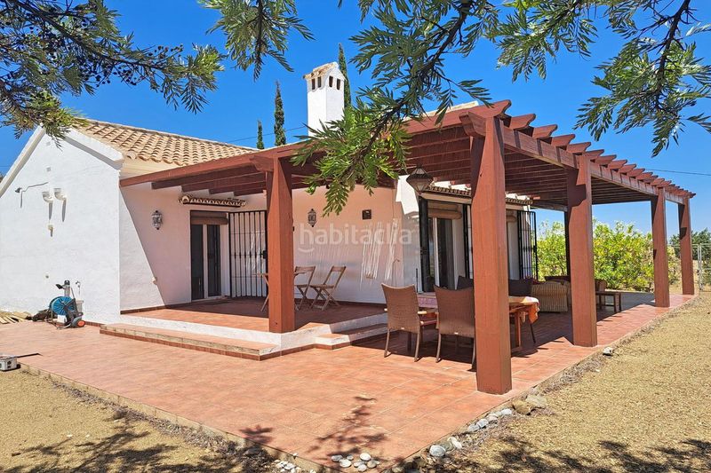 Foto b8904c72-28d2-4667-960d-dde93d1e76ce. Masia amb aparcament piscina a Tolox