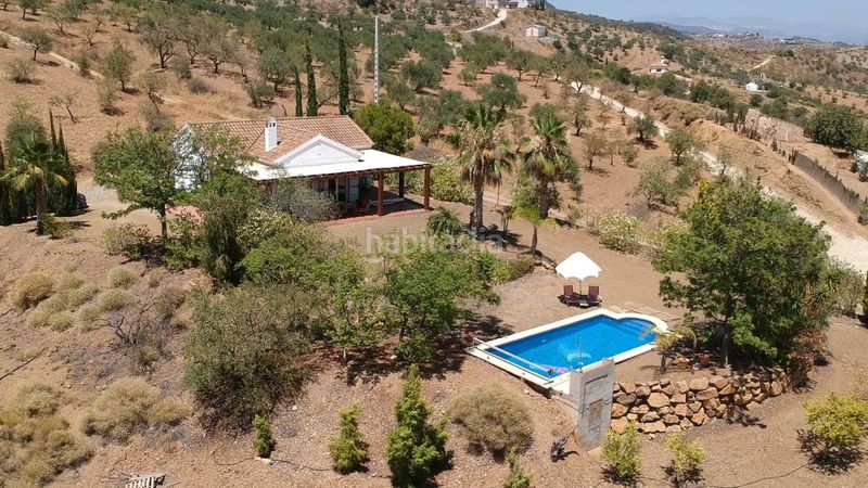 Foto f2f3b069-5964-4d3b-a0cd-f887061568f6. Masia amb aparcament piscina a Tolox