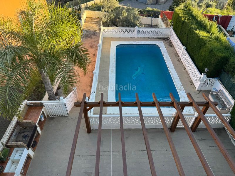 Foto 57c05cf3-f635-4bfd-a2b3-dcc12f3d6420. Casa aparellada amb calefacció aparcament piscina a Chiva
