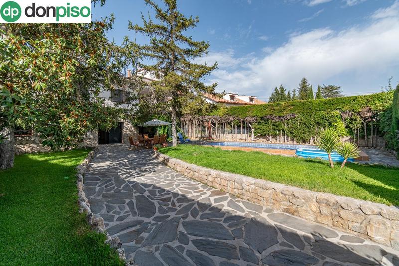 Foto a38d1e5c-061d-443a-88f6-471546648ea0. Chalet preciosa casa con piscina privada en urbanización molino alto en Huétor de Santillán