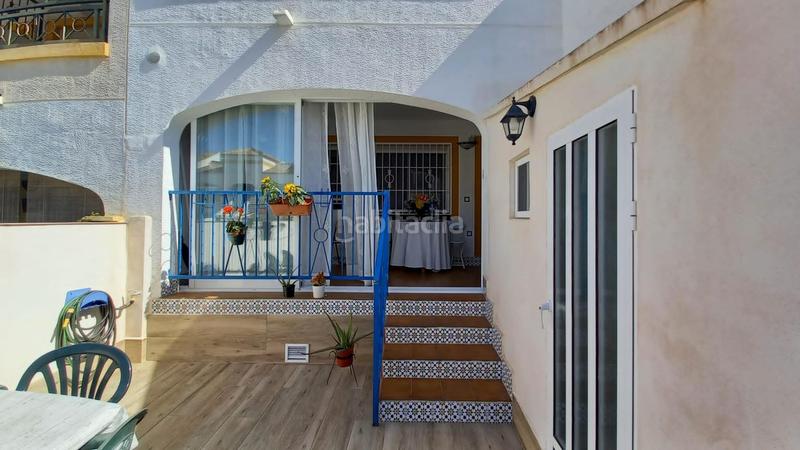 Foto 4e7c5a6f-1c2a-4972-b1e3-3429106a0464. Casa adossada amb calefacció aparcament piscina a Santa Pola