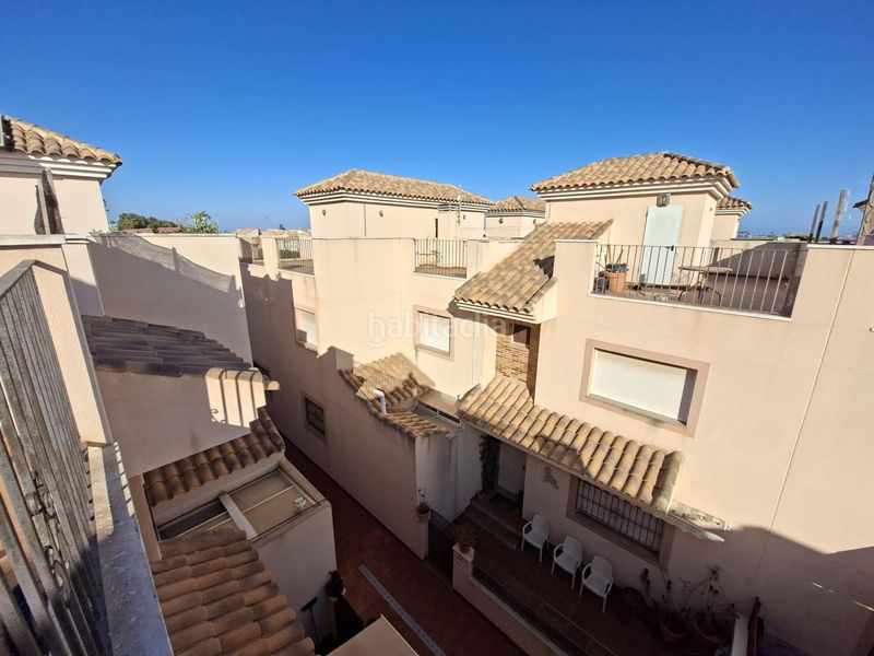 Foto f18dd7d5-6e11-4d80-a3e0-7c0aa37197bd. Casa adossada amb aparcament piscina a San Javier San Javier