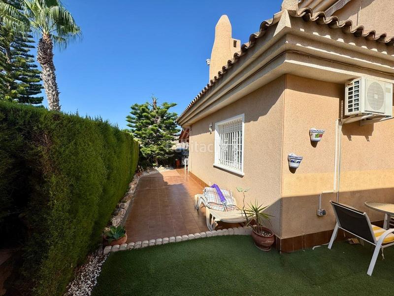 Foto 1a1e46de-60d9-417a-9405-a3cef6d59a26. Chalet mit heizung parking pool in Punta Prima Orihuela