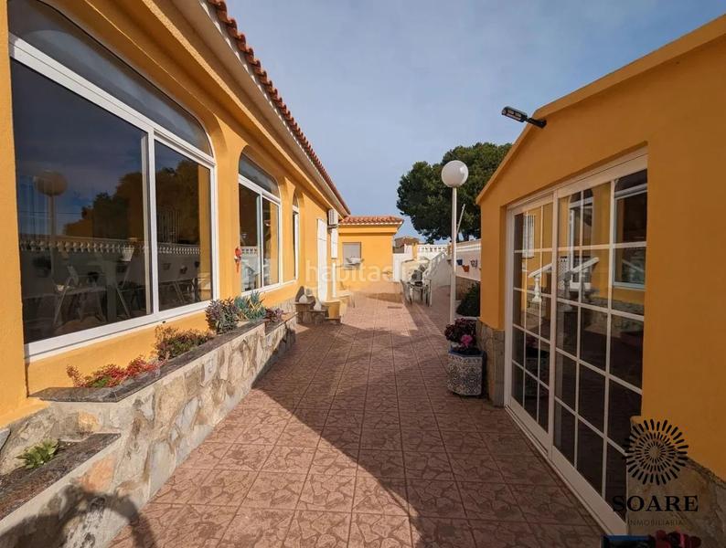 Foto 1572ccb2-fcc6-476d-9713-2717ae7c7a35. Chalet  en venta en playa Mar Chica, 5 dormitorios. en Benicarló