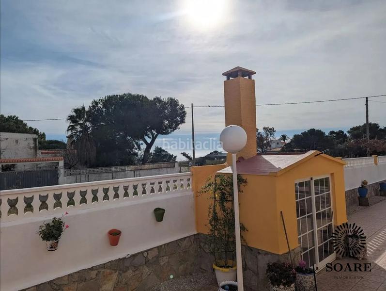 Foto d15f6707-aca3-4a42-ad19-34bda867006c. Chalet  en venta en playa Mar Chica, 5 dormitorios. en Benicarló