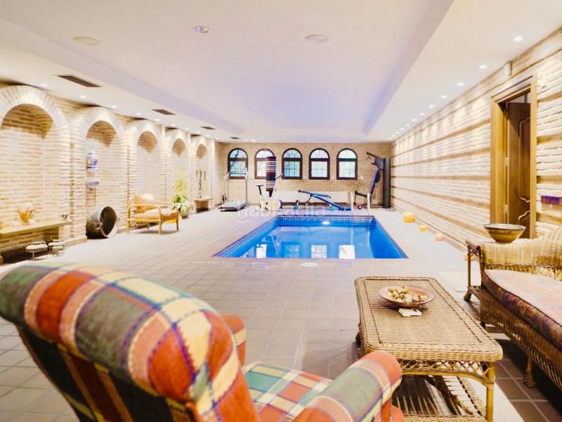 Foto acd657a7-64bb-4e09-b628-01882cadb749. Chalet avec cheminée chauffage parking piscine dans Rozas de Madrid (Las)