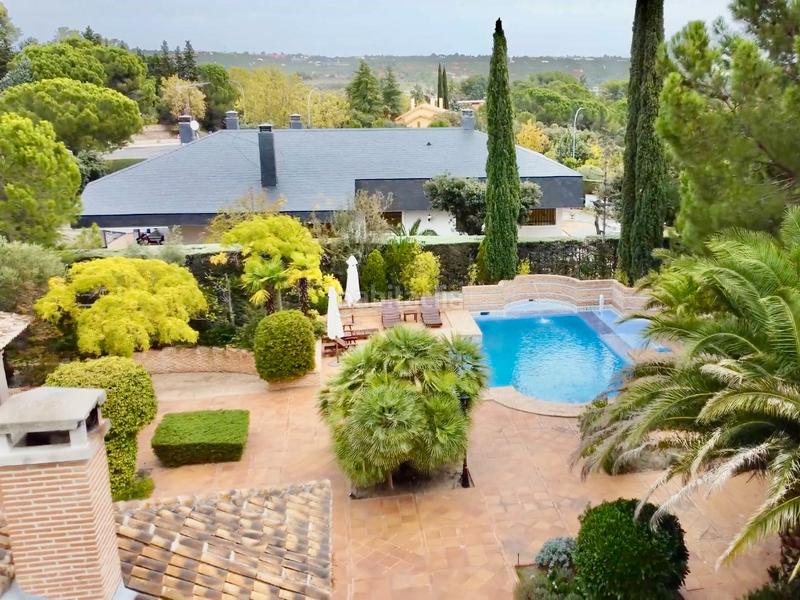 Foto da3fc3d4-7fec-4533-8e17-106aff959a5a. Xalet amb xemeneia calefacció aparcament piscina a Rozas de Madrid (Las)