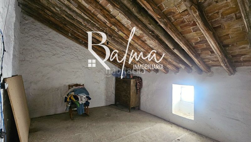 Foto 49c8085f-fb74-485a-bc51-f77ece8bd5bb. Casa adossada a Alfarnatejo