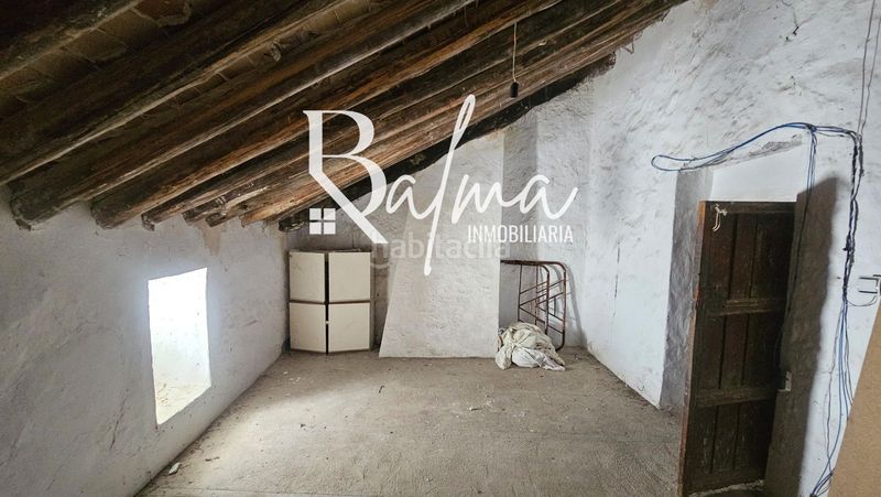 Foto a19ff40f-b3b9-47f5-978f-488764bc22cc. Casa adossada a Alfarnatejo