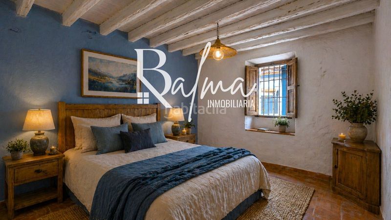 Foto ee4f80e5-d77a-4ebf-acc3-d97e07db778a. Casa adossada a Alfarnatejo
