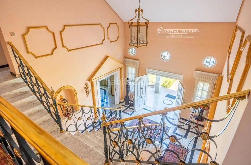 Foto 914864d3-c4fb-4d13-9b1f-1c810747802c. Maison avec cheminée chauffage parking piscine dans Aljaraque