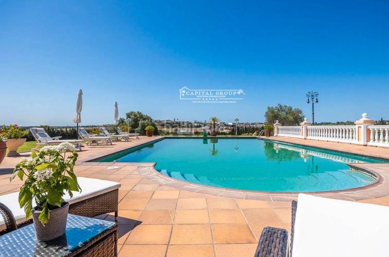 Foto e36f2353-d6cb-4a86-96f4-a419401f1c3f. Maison avec cheminée chauffage parking piscine dans Aljaraque