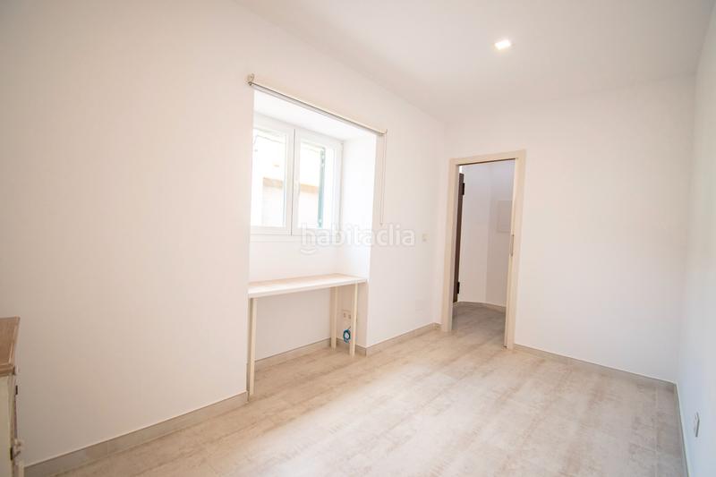 Foto f82fe45a-2b80-47ca-abcd-70d1444b56f5. Planta baixa amb xemeneia calefacció aparcament piscina a Marratxí