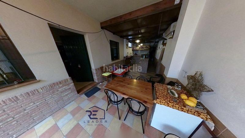 Foto 26719272-4307-4347-a1bb-cc30f3dc66cc. Casa adosada en Guillena