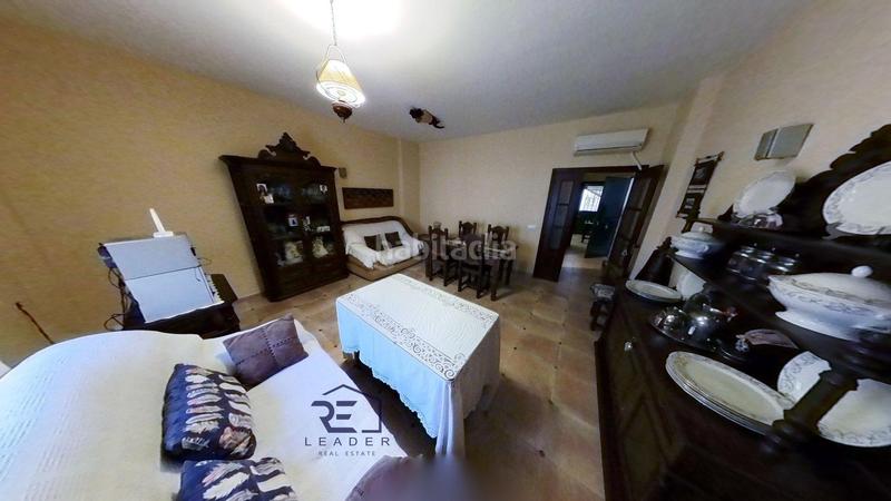 Foto 72392489-8cbc-4fd7-9382-0c6d45359102. Casa adosada en Guillena