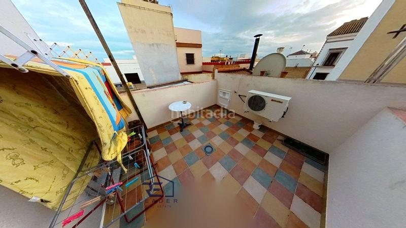 Foto c7a9343c-56a4-4361-b0b2-ad68b8cc26fe. Casa adosada en Guillena