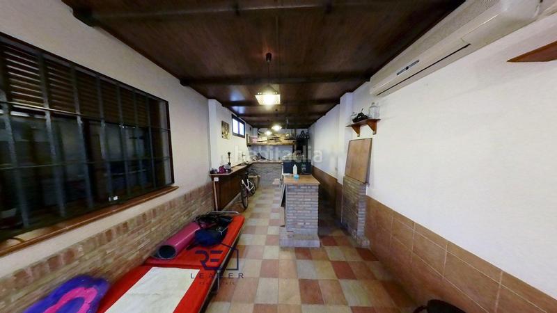 Foto cf8dec28-2d42-4f0b-89f8-60904f613981. Casa adosada en Guillena