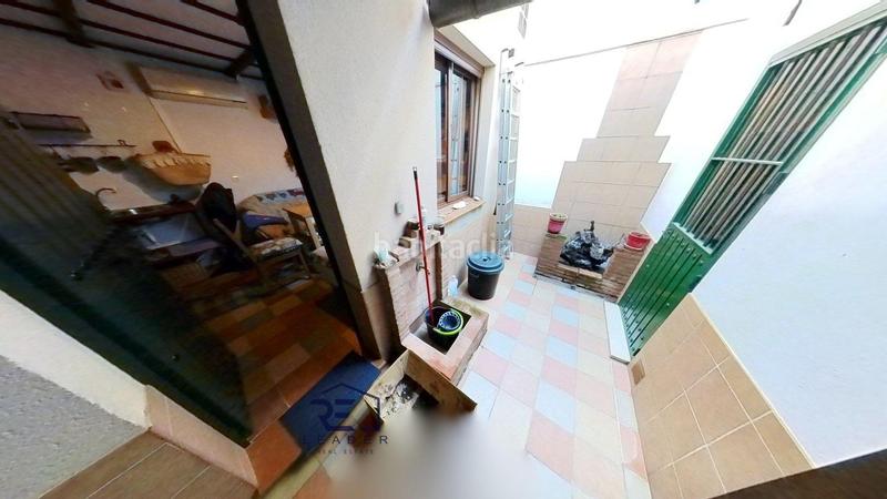 Foto de5cca7d-eaa3-4061-8514-d9cc01044a9c. Casa adosada en Guillena