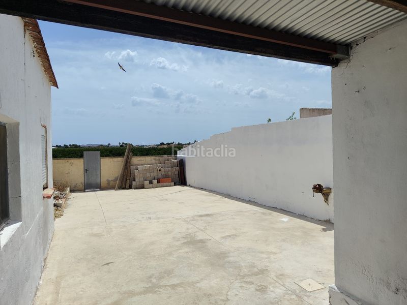 Foto b5b9f8c9-d7ff-4fe9-83a1-b5644709ea37. Casa adossada amb xemeneia a Rafal