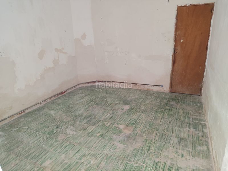 Foto e7ef1fcb-b5da-4eff-89bc-d0edd77c48ed. Casa adossada amb xemeneia a Rafal