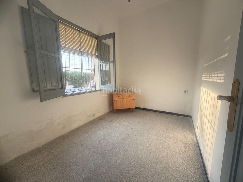 Foto f561da33-50f1-4490-a180-404861c3ebee. Casa adossada amb xemeneia a Rafal