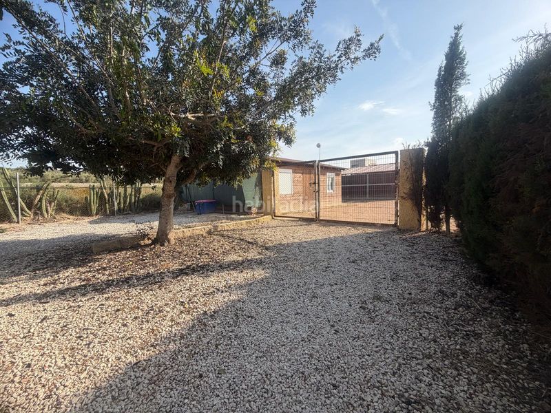 Foto 2a5bed7b-d6a9-4299-b9a3-2afd16e48d6f. Casa amb aparcament piscina a La Marina Elche / Elx