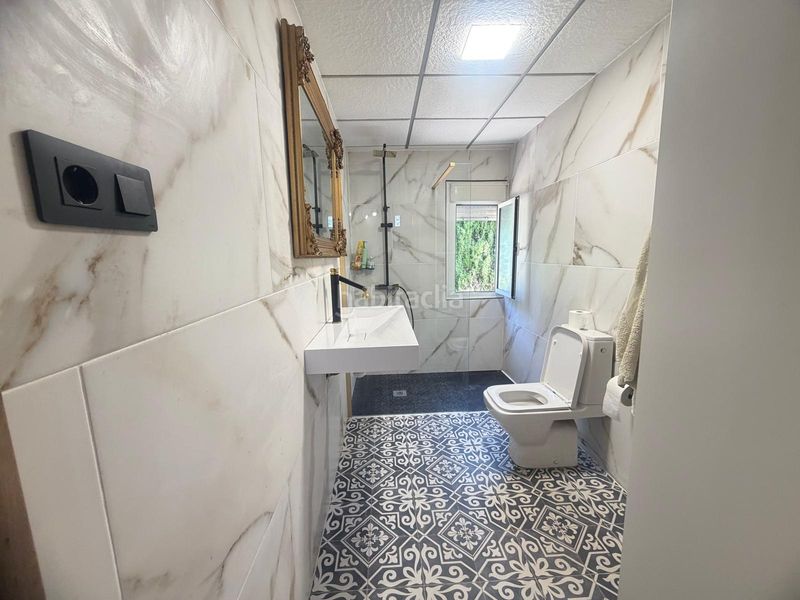 Foto 5781a4f8-915d-47ff-8bec-0fb010789f3e. Casa amb aparcament piscina a La Marina Elche / Elx