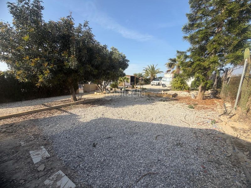 Foto 678b6f2c-dd71-4c77-8161-88d02bb28ef9. Casa amb aparcament piscina a La Marina Elche / Elx