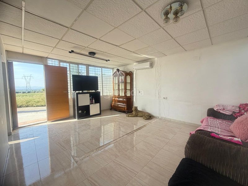Foto 86ec0f0f-a285-4d66-8139-80f57ccefe29. Casa amb aparcament piscina a La Marina Elche / Elx