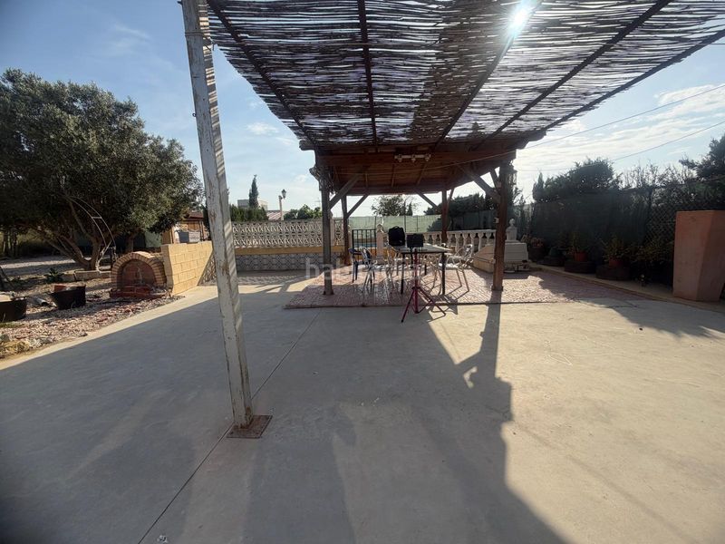 Foto 9709e521-e3a5-40a4-90b8-0f60206d377d. Casa amb aparcament piscina a La Marina Elche / Elx